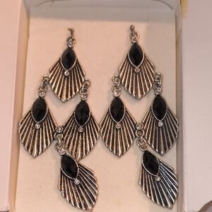 mark. Black and Silver Fan-Shaped Earrings